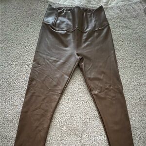 Wore once dark brown leather skinny pants.